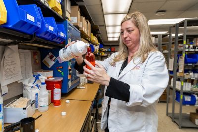 Jessica Dolinger working in the pharmacy at the Veterinary Teaching Hospital.
